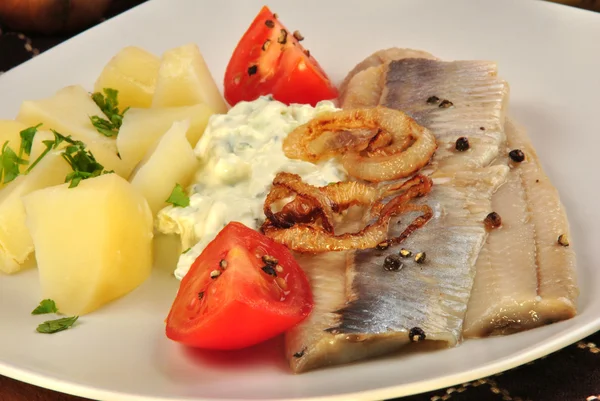 Some fresh organic herring with boiled potato — Stock Photo, Image