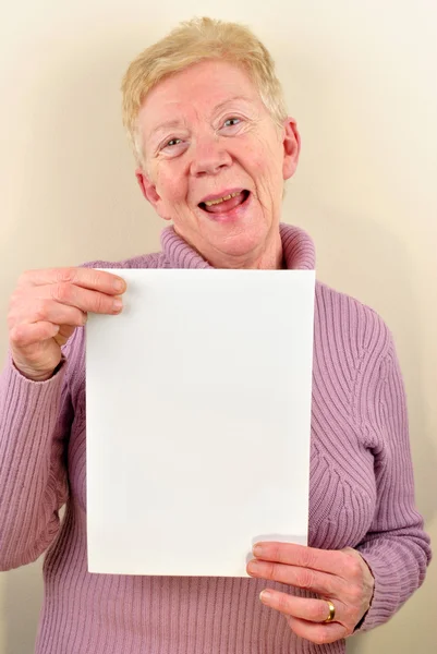 One old woman holding some white paper — Stock Photo, Image