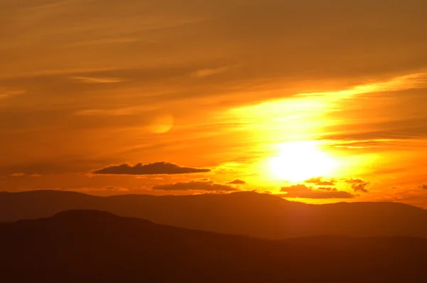 stock image Golden sunset and moon on one picture