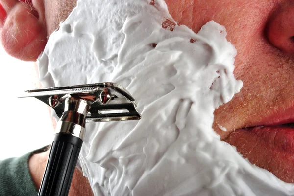stock image One wet shaving razor and some foam in a face