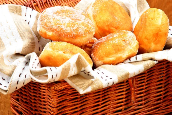 Home made jelly filled donut in a basket — Stock Photo, Image