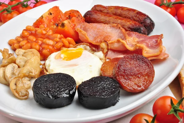 Traditional irish breakfast on a large plate — Stock Photo, Image