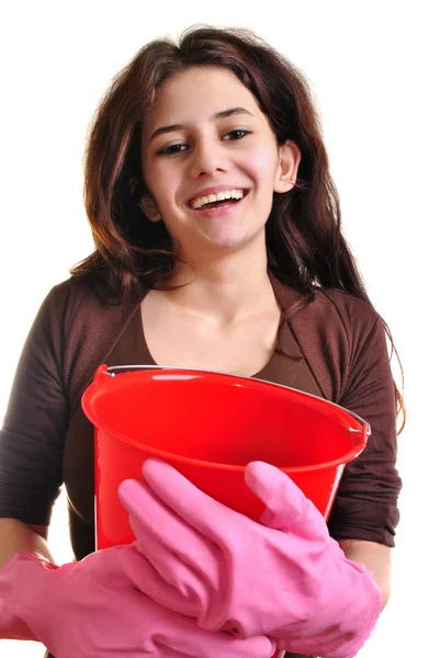 Mladá žena s kbelíkem a rukavice — Stock fotografie