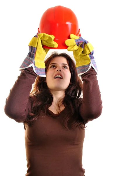 Young woman holds a red safety helmet — Stock Photo, Image
