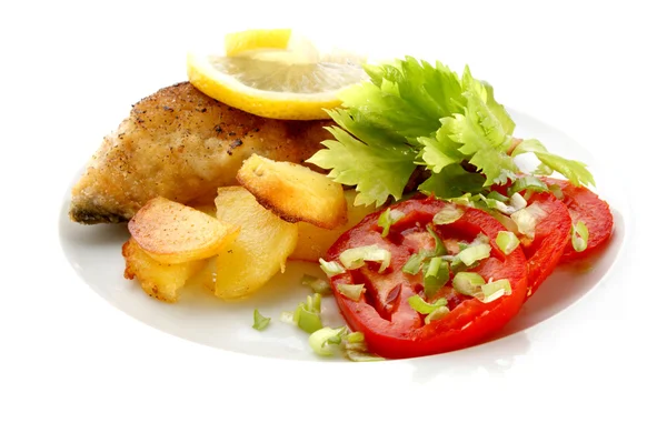 Grilled carp steak on organic potato with vegetable — Stock Photo, Image