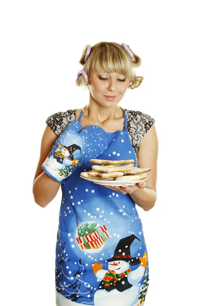 Young woman prepared cookies for Xmas Stock Picture