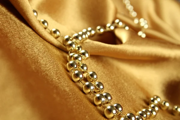 金色织物的背景 — 图库照片