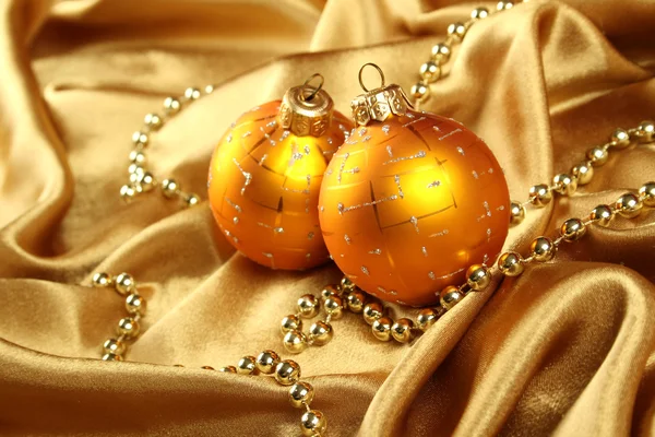 Gold Fabric Gold Ornaments Christmas Balls Yellow Background — 스톡 사진