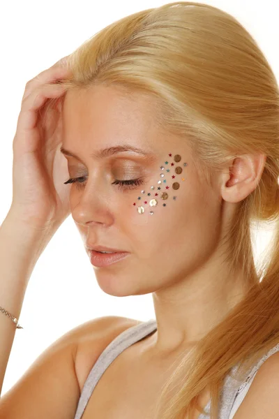 Beautiful woman with makeup and sequins — Stock Photo, Image