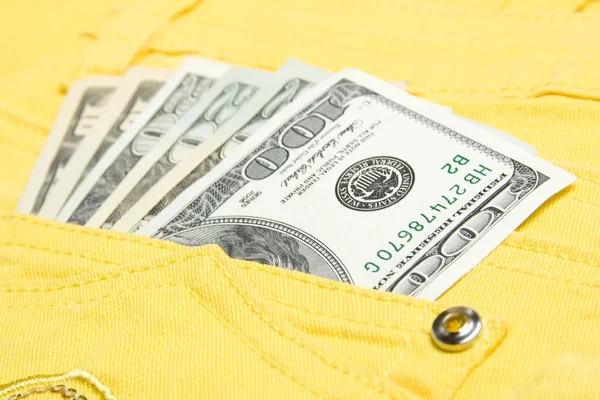 Os dólares estão no bolso da calça. — Fotografia de Stock