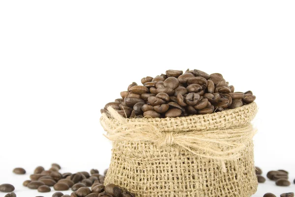 Koffiebonen in een zak — Stockfoto