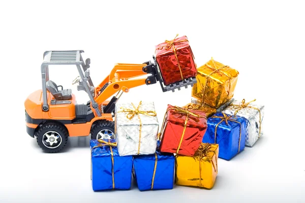 Modelo Caminhões Brinquedo Deslocado Presentes Envolto Papel Colorido Brilhante Amarrado — Fotografia de Stock