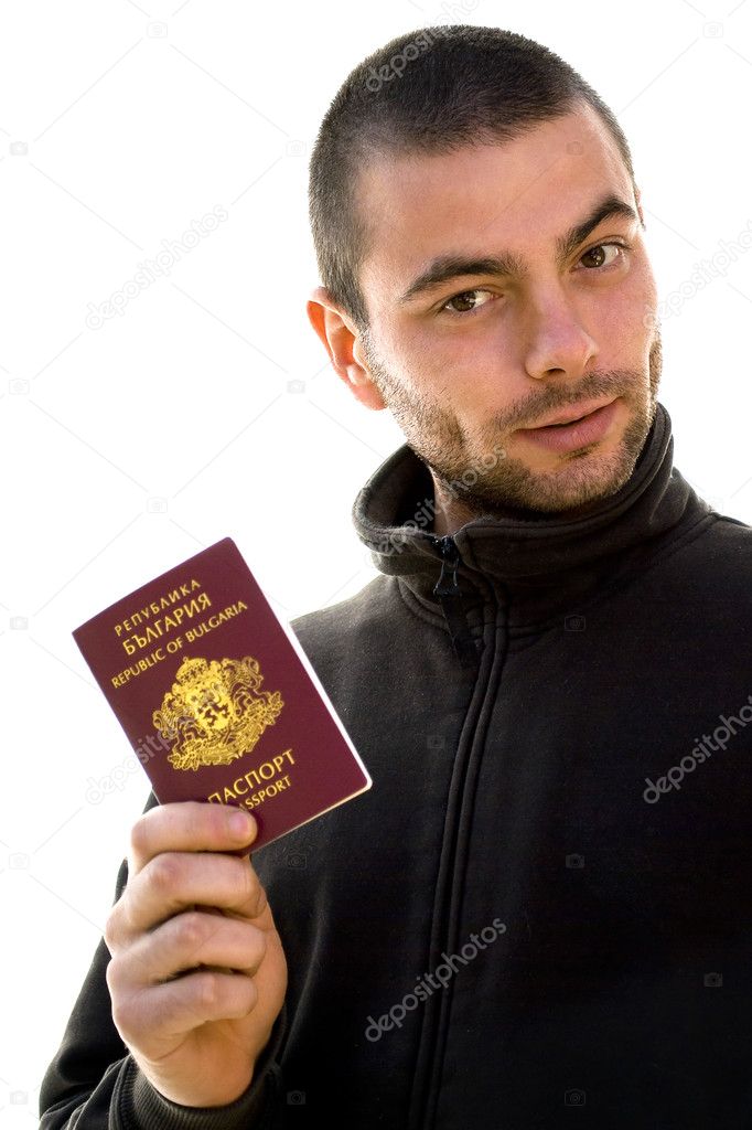 Young man holding passport