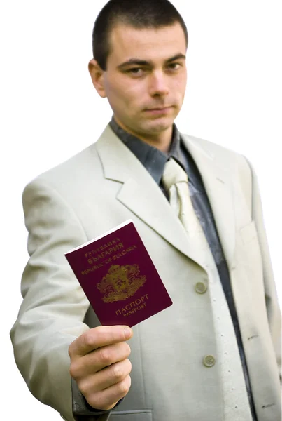 Young business man holding passport — Stock Photo, Image