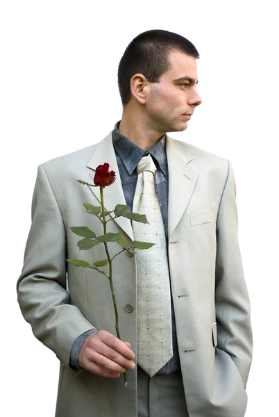 バラを保持しているハンサムな男 — ストック写真