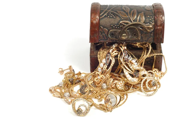 Vrouw gouden sieraden — Stockfoto