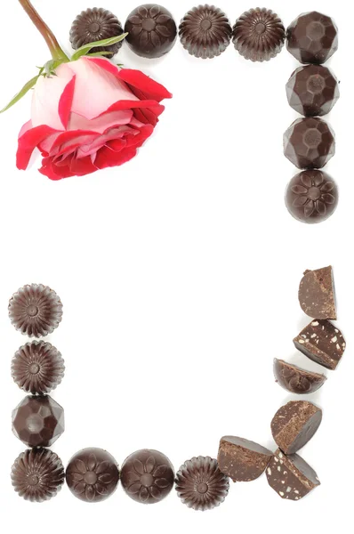 Роза и шоколад — стоковое фото