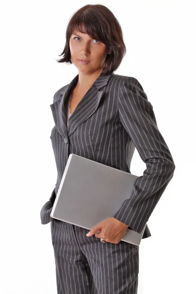 ノート パソコンで立っている女性実業家 — ストック写真