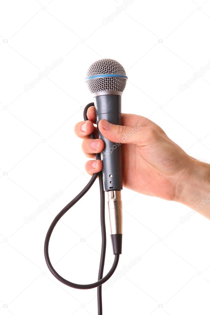 Microphone in male hand isolated on white