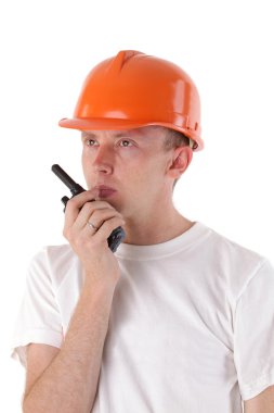 Builder talking on portable UHF radio transceiver isolated clipart