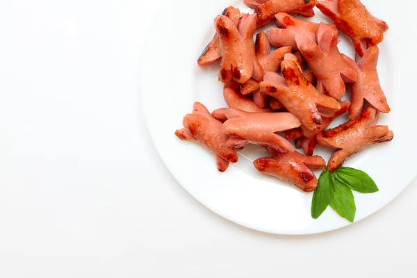 stock image Grilled sausage with basil