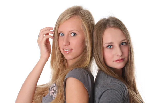 Two young female friends smiling together — Stock Photo, Image