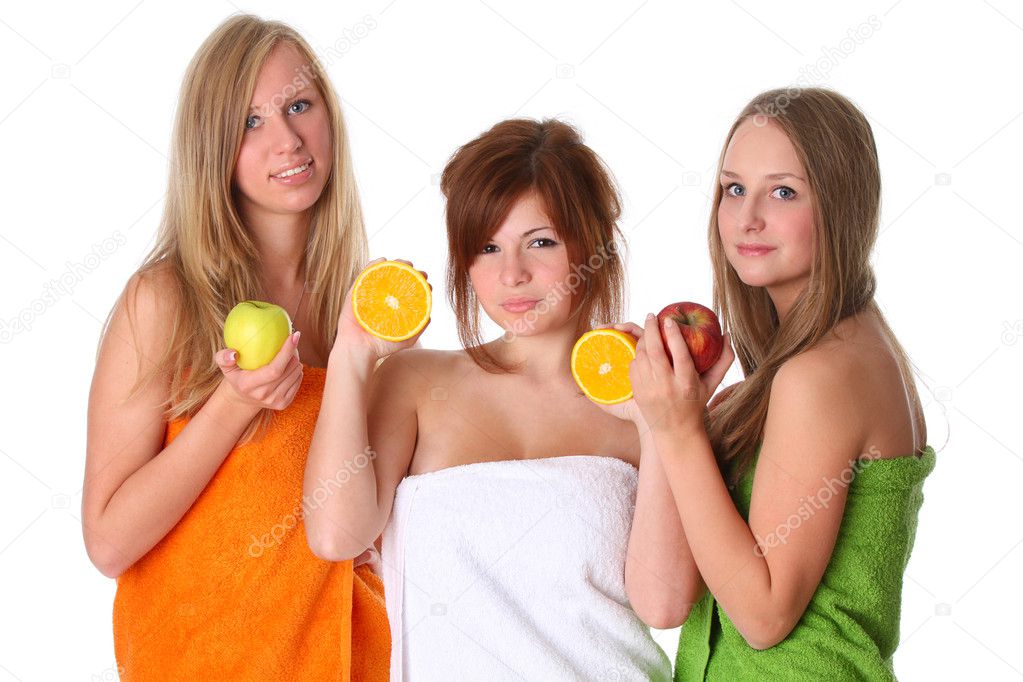 Beautiful young women with fruit - healthy eating isolated on wh