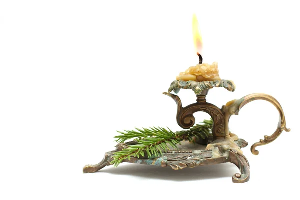 Vintage candlestick with christmas fir branch — Stock Photo, Image