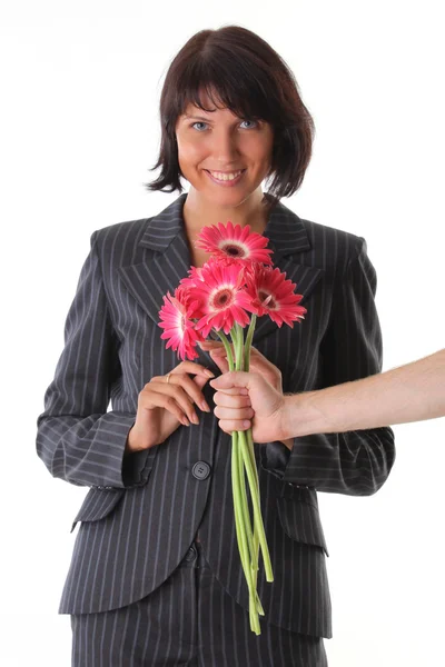 Verrassing - vreugde vrouw en mannenhand met bloem — Stockfoto