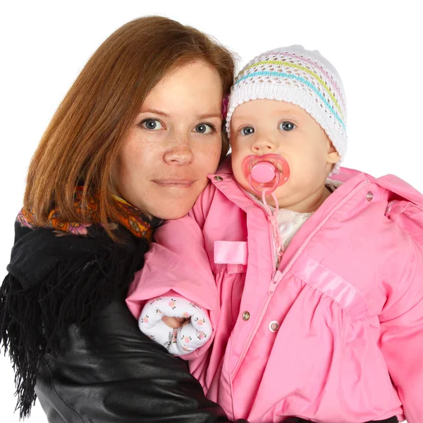 Moeder en baby in winter jassen — Stockfoto