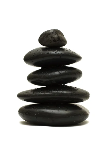 Zwarte stenen geïsoleerd op witte achtergrond — Stockfoto