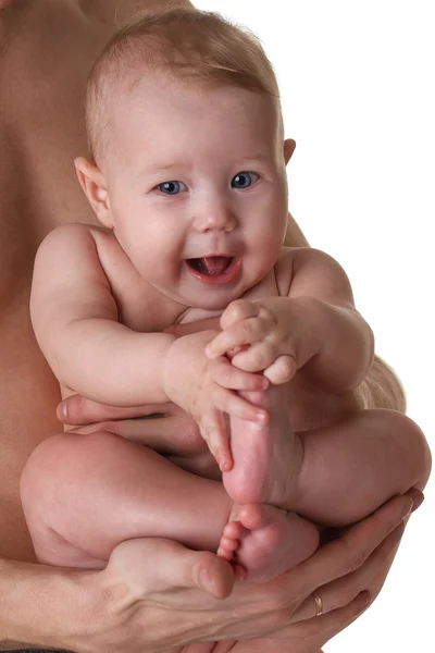 Baby on father's caring hands — Stock Photo, Image