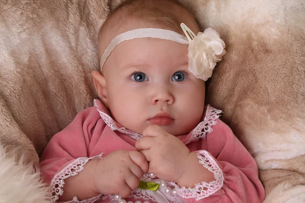 Baby girl with flower headband — Stock Photo, Image