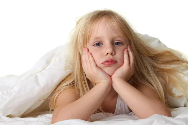 Bedtime - child in bed with white blanket — Stock Photo, Image