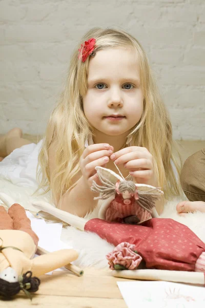 Portrait Little girl with handmade toys — Stock Photo, Image