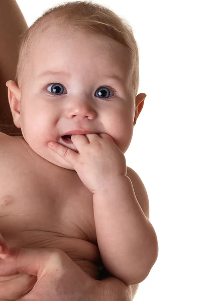 Pequeno bebê com um olhar surpreso em seu rosto — Fotografia de Stock