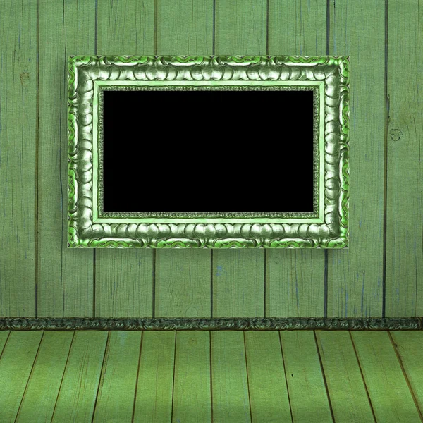 Fotorahmen hängen an der grünen verschwommenen Wand - altes Album-Backgr — Stockfoto