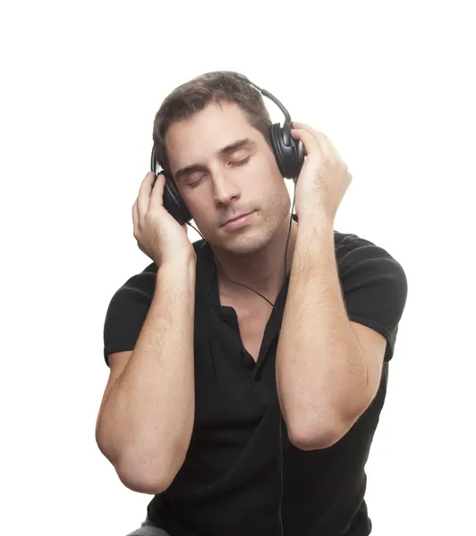 Muž poslouchá hudbu — Stock fotografie