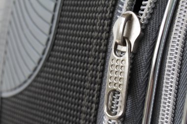 A zipper on suitcase