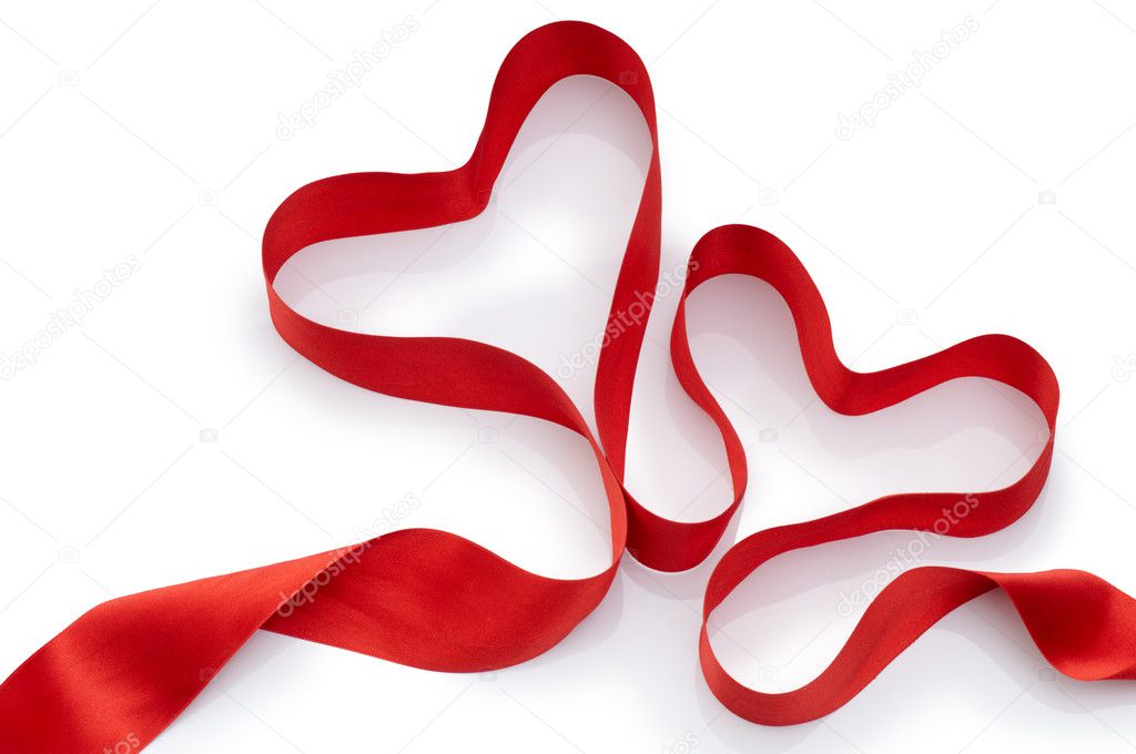 Red silk ribbon on the white background