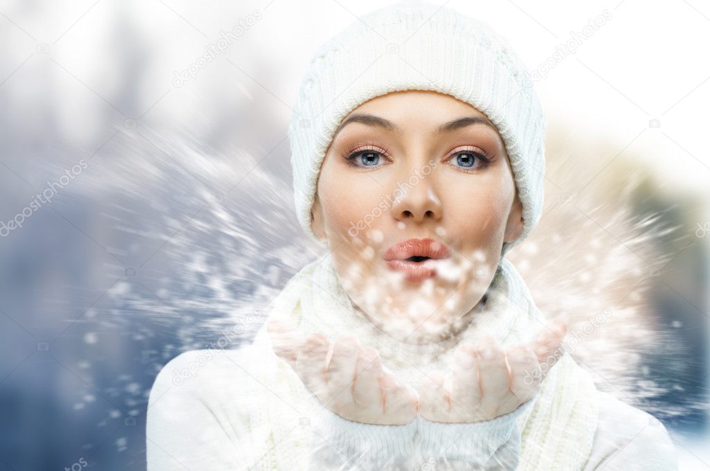 A beauty girl on the winter background