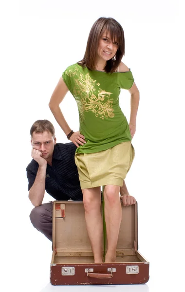 stock image Couple opens a suitcase with a surprise or gifts.