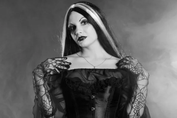 Gothic lány füst háttér — Stock Fotó