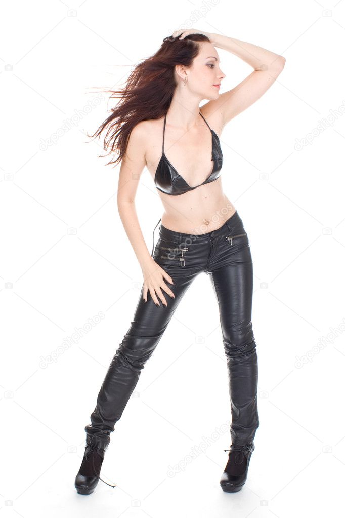 Sexy brunette in black leather pants