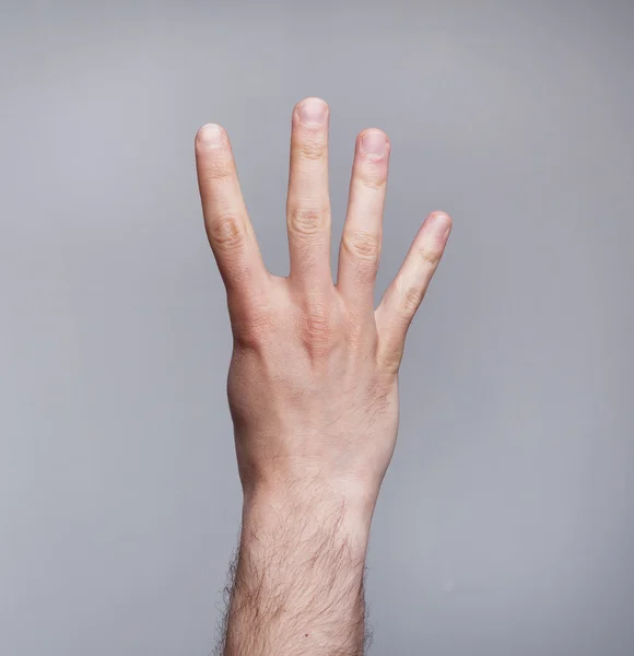 Four-fingers figure — Stock Photo, Image