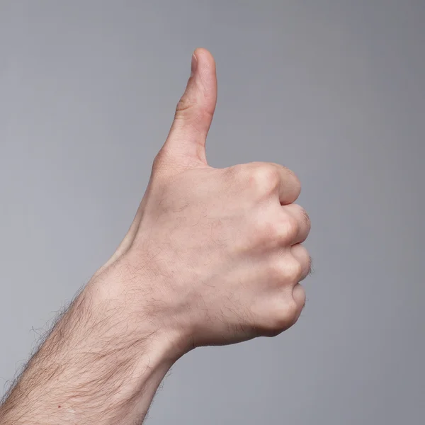 Sign of thumb-up figure — Stock Photo, Image