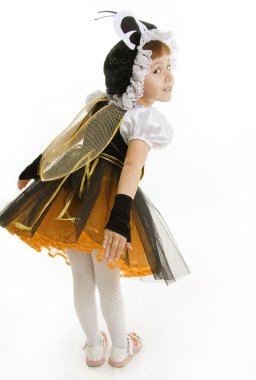 Small girl is dressed at bee costume clipart