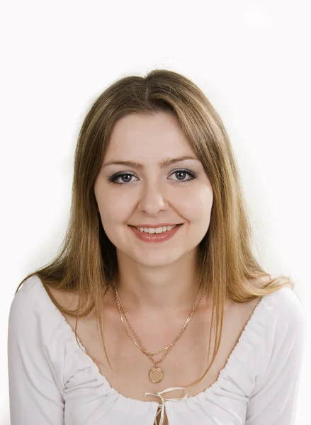 Schöne Frau lächelt auf weißem Hintergrund — Stockfoto