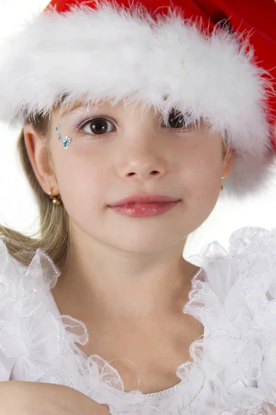 Claus şapka, sevimli küçük kız — Stok fotoğraf