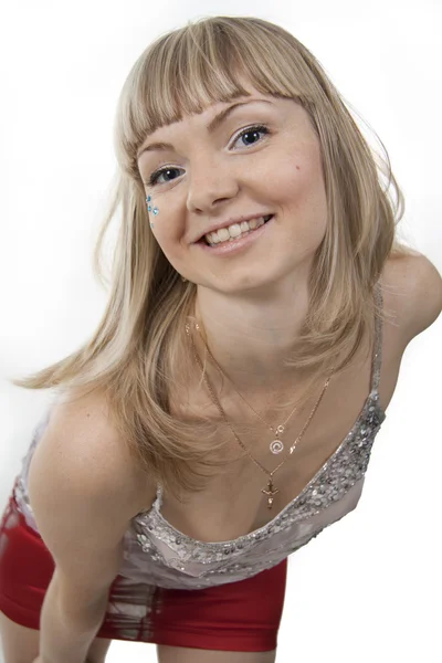 Menina coquete bonita a loira em um fundo branco — Fotografia de Stock
